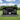 companion black granite with last name, large scenery engraving, a couples headshot photo in between first and last names and birth an death date, and an epitaph