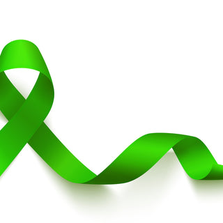 a green ribbon on a white background