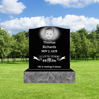 black granite infant headstone, baby headshot photo, name, date, a floral graphic with the words "in loving memory" and an epitaph