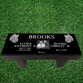 Bench Memorial Headstone Seat with 2 angel graphics on the top left and right corners, a last name in the top middle, a couple headshot photo, and father and mother first name and born date and death date on either side.