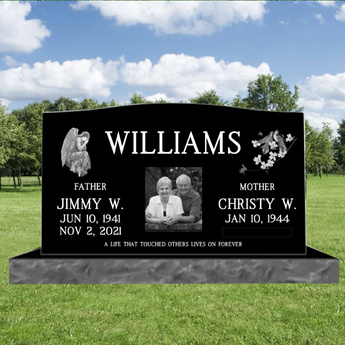 companion black granite headstone with corner graphics, last name. Father and mother names and dates on either site of the couples headshot photo, and an epitaph. 