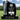 Standing Angel Headstone with a headshot photo, name, birth and death date, an action photo and a epitaph on the base.