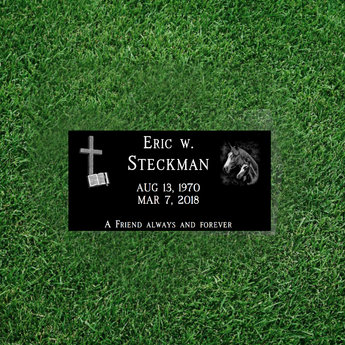 flat black granite grass level headstone with two corner graphics, name, date and epitaph