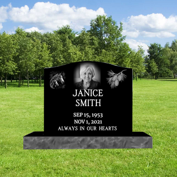 single black granite headstone with 2 top corner graphics, a headshot photo, a name, dates and epitaph