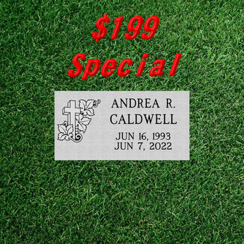 grass level grey granite headstone with a cross engraving, name and birth and death date. it reads $199 special